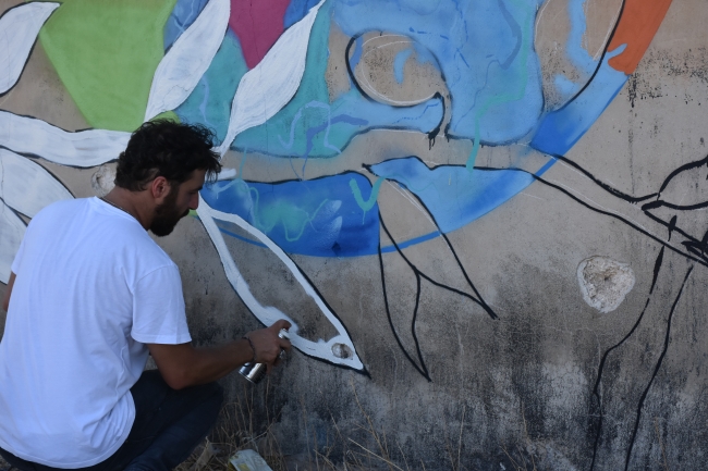 Türk grafiti sanatçılarından Suriye'de anlamlı çizimler