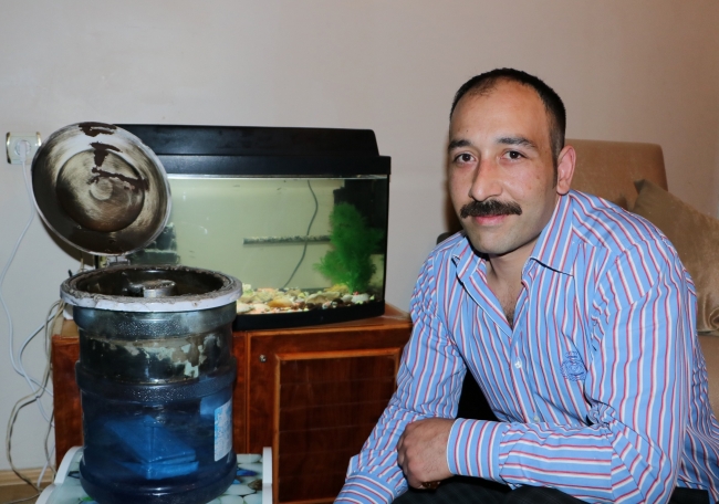 Sıcaktan bunalınca damacanadan klima yaptı