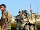 ABD'den gelenler YPG üniforması giyip kalaşnikof taşıyorlardı