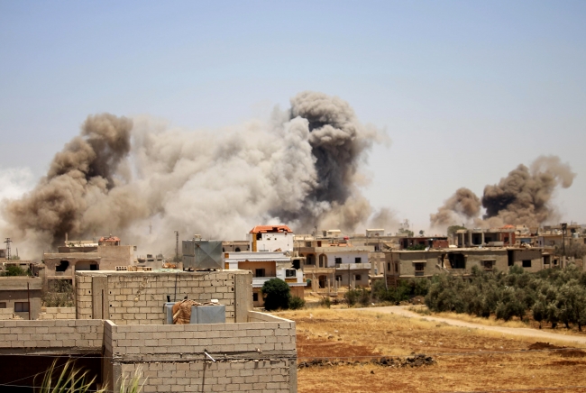 Esed ve destekçileri Dera'da katliam yapıyor