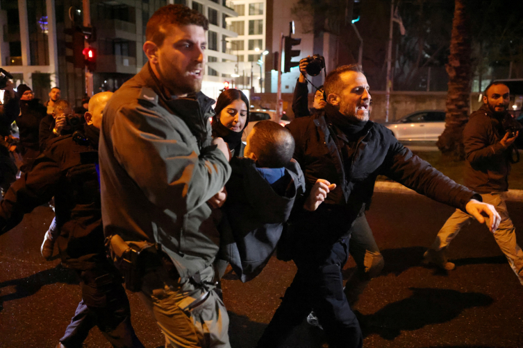 İsrail polisi 'soykırımı saklayamazsınız' pankartlarına el koydu