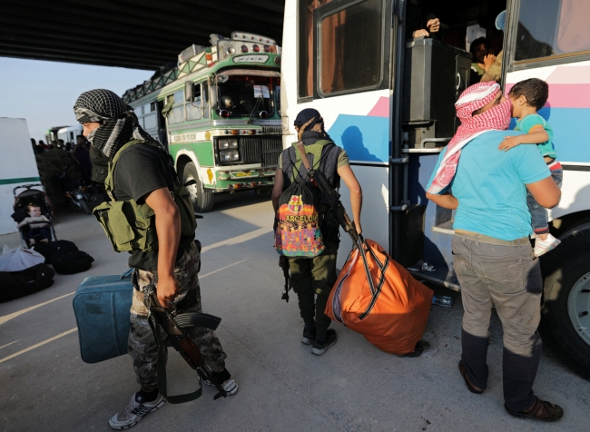 Suriye'nin Dera şehrinden zorunlu tahliyeler sürüyor