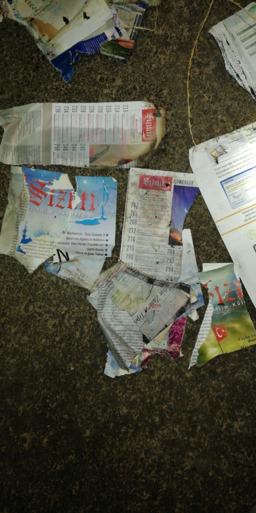 FETÖ şüphelisi, örgüte ait yayınları yakmaya çalışırken yakalandı