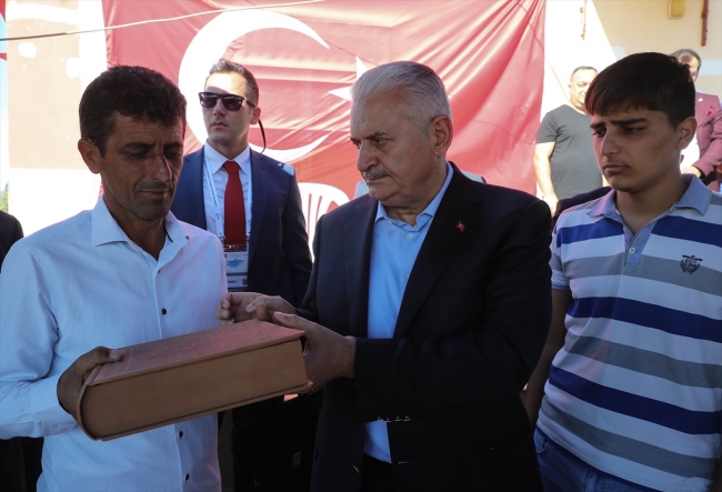 TBMM Başkanı Binali Yıldırım şehit Uzman Çavuş Ali Hekim'in ailesini ziyaret etti
