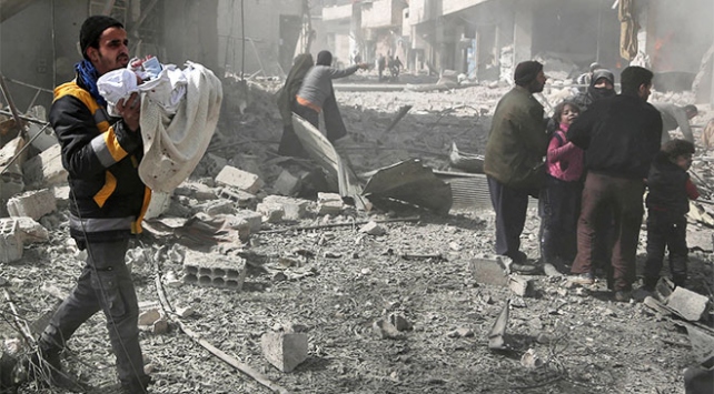 Doğu Guta'da bir günde 100'e yakın sivil katledildi