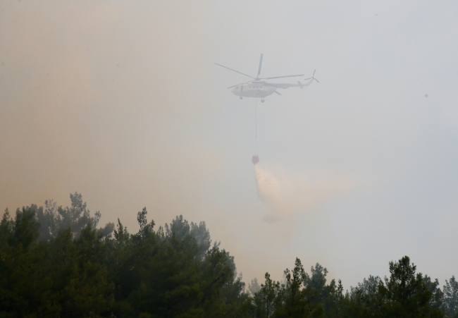 İzmir'de 53 saatte kontrol altına alınan yangına 7 bin 500 ton su atıldı