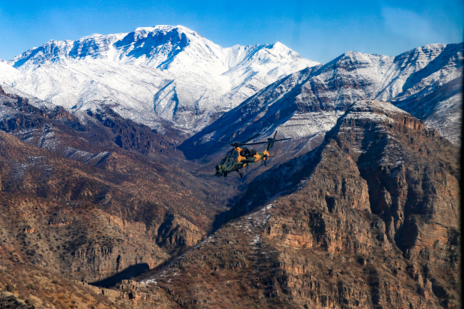 ATAK helikopterleri Türkiye'nin terörle mücadelesinde en önemli vurucu güçlerinden biri. Foto: AA