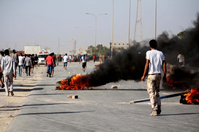 Ülkede, silahlı gruplar arasındaki çatışmalar uzun süredir devam ediyor. Fotoğraf: AP