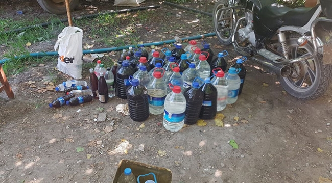 Adana'da sahte içki imalathanesine dönüştürülen eve baskın