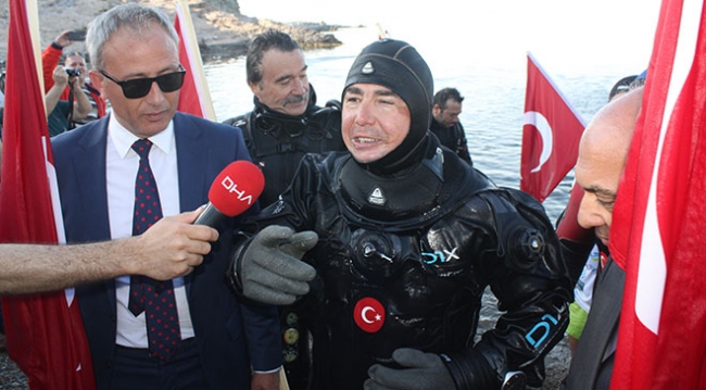 'Akvaryum adam' su altından rekorla çıktı