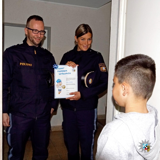 Alman polisinden Kenan'a "Süper Kahramanlık Sertifikası"