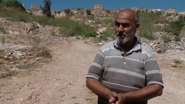 Muhammed Barudi, hükümete gecekondu mahallelerinde iyileştirmeler yapılması çağrısı yaptı. Fotoğraf: TRT Arabi