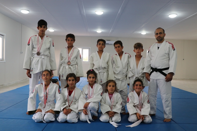 Camide imam, minderde antrenör