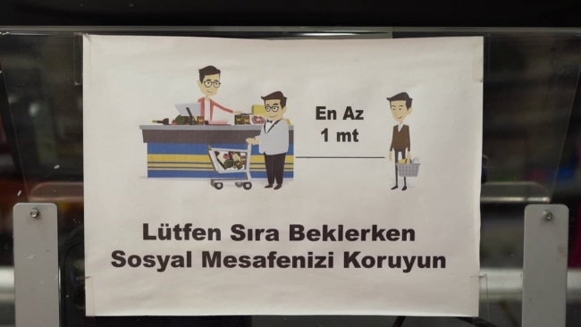 Marketlerde mesai tedbirlerle sürüyor