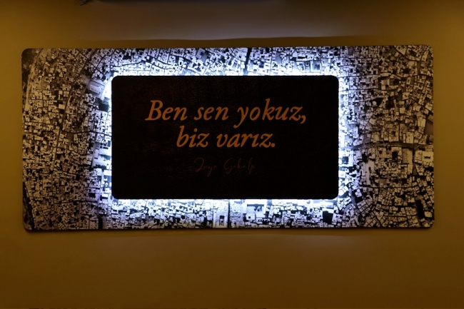 Teröristlerin yaktığı müze kapılarını açtı